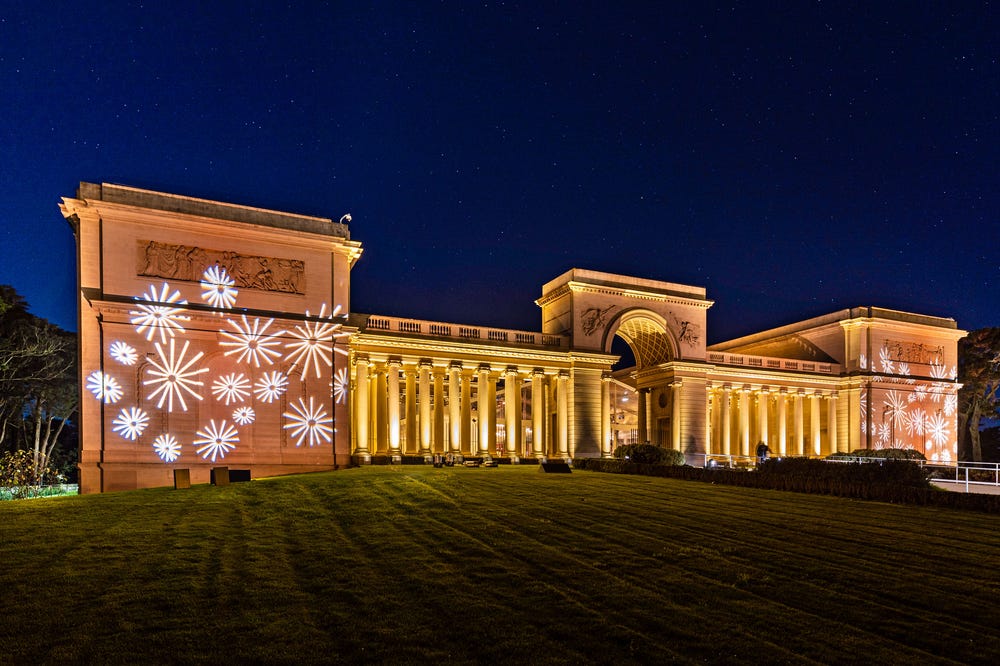 Legion of Honor with projected lights during a corporate event