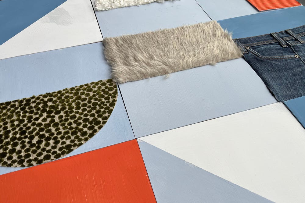 Squares on floor with different colors and textures
