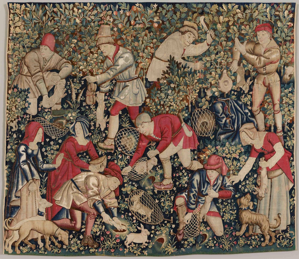 Tapestry depicting a busy scene of men and women catching rabbits