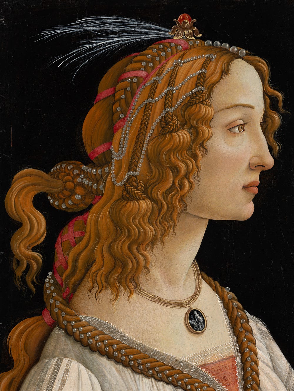 Woman with elaborate hair style facing right