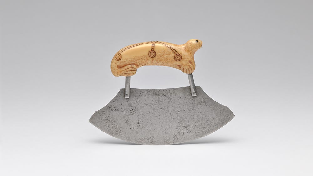 Knife tool with handle shaped like an animal