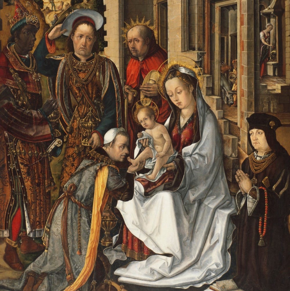 Mary holding baby Jesus, being adored by the magi