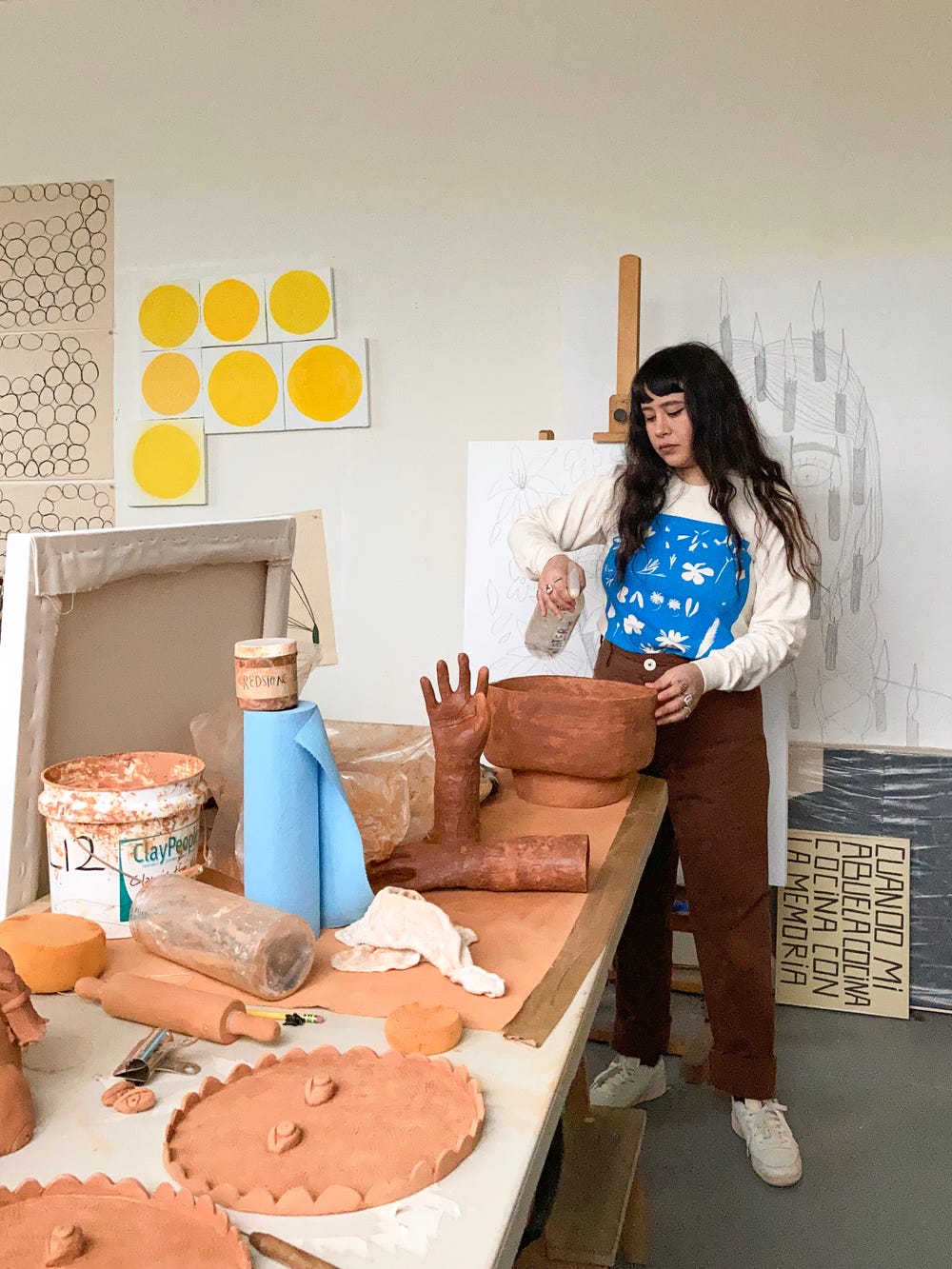 Liz Hernández working in her studio