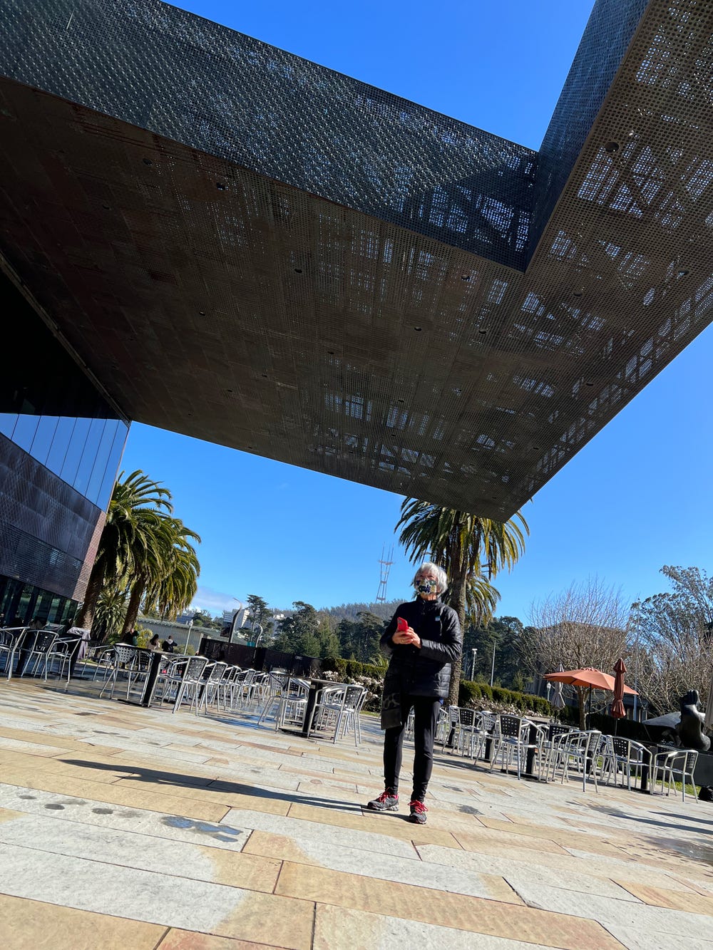 Nellie Wong standing outside the de Young museum