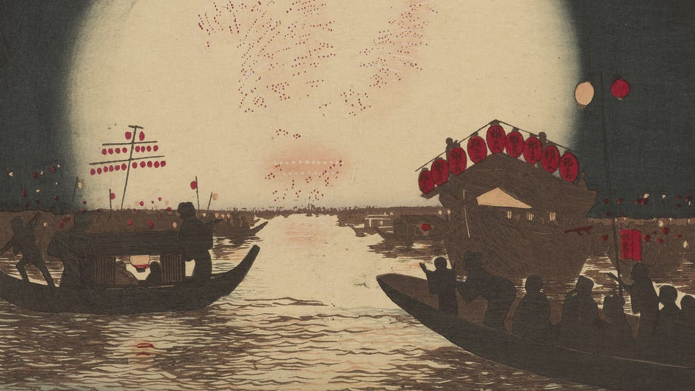 Fireworks set off above boats on water