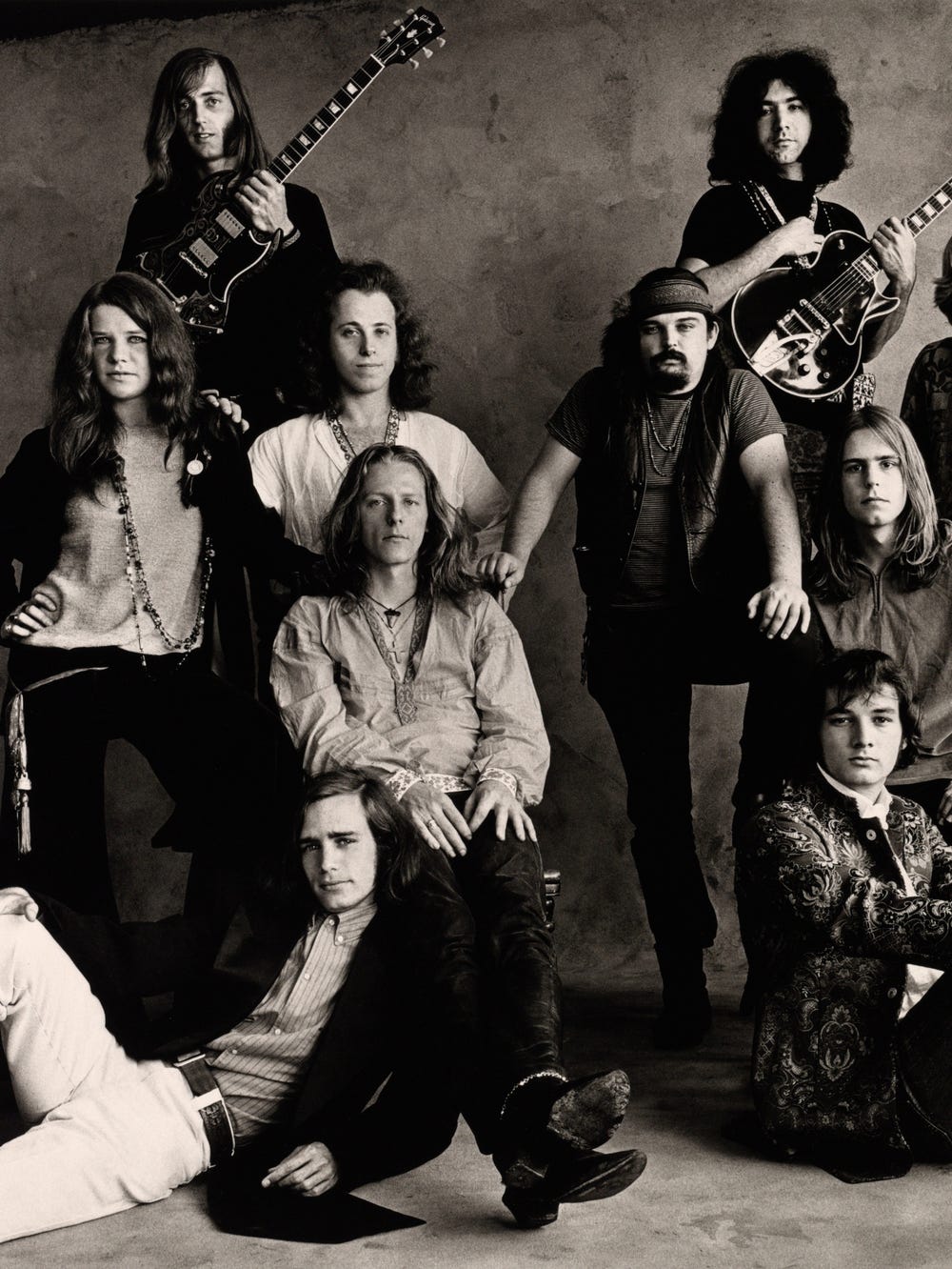 Rock groups posing for a portrait by Irving Penn