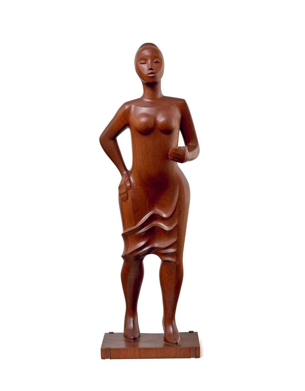Sculpture of a woman standing in a confident pose