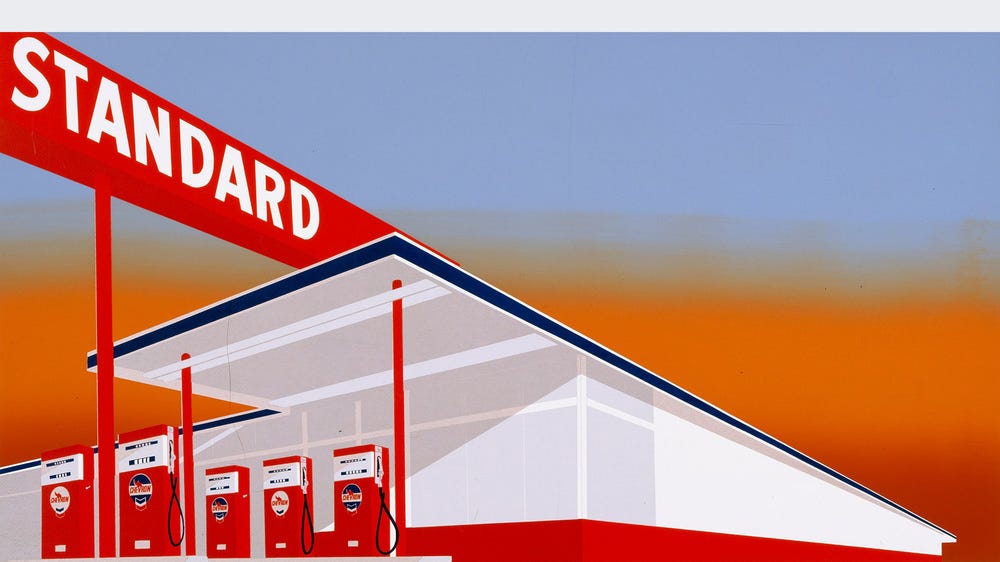 print of a gas station in reds, oranges, and blues