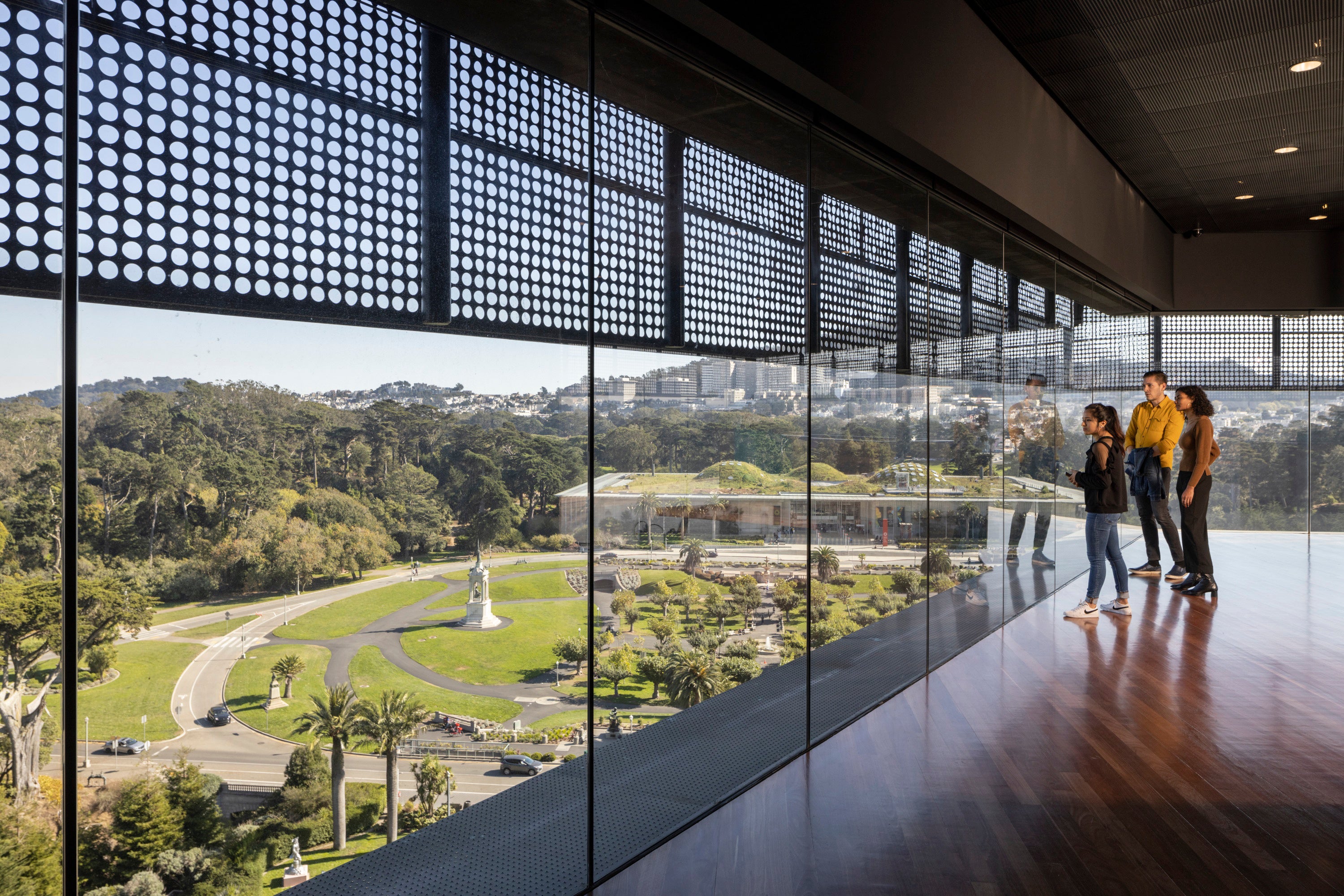 People looking out window in Hamon Tower