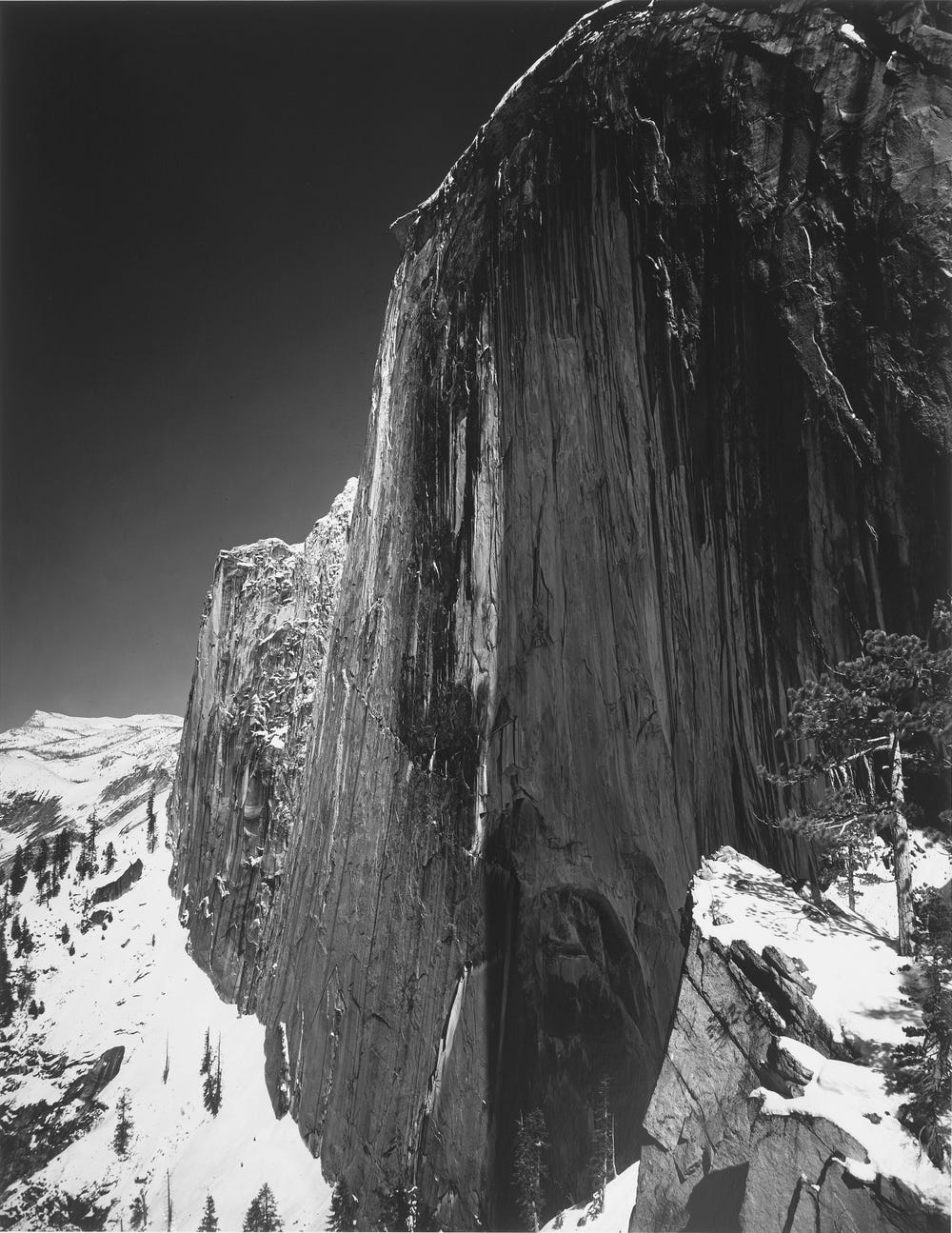 Black and white photograph of Half Dome by Ansel Adams