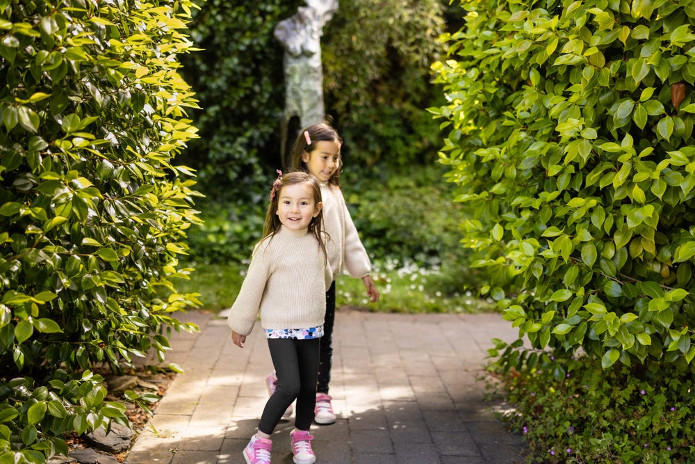 Two young girls in de Young sculpture garden