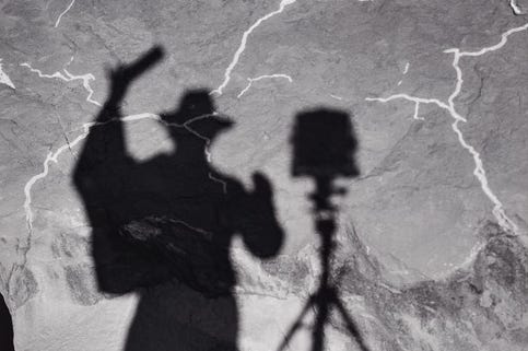 Photograph by Ansel Adams showing his shadow