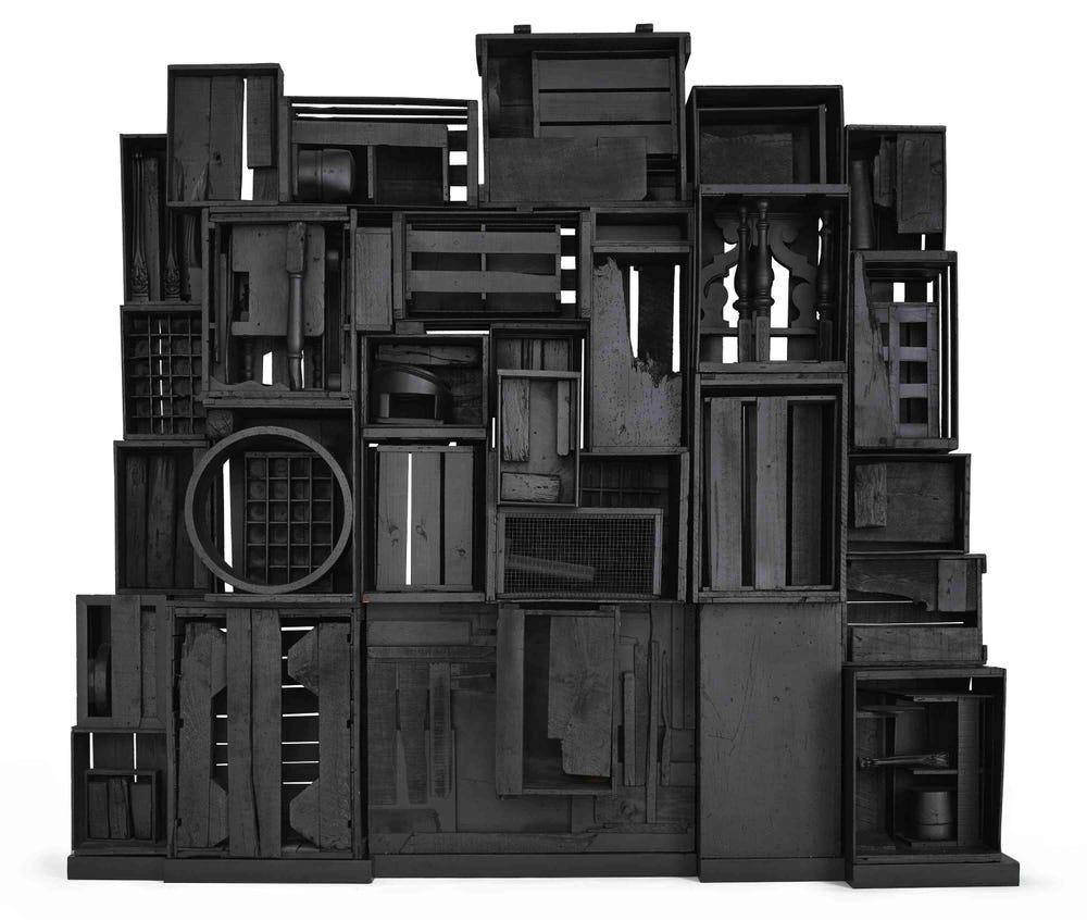 Sculpture made of recycled materials (boxes, banister, etc) by Louise Nevelson