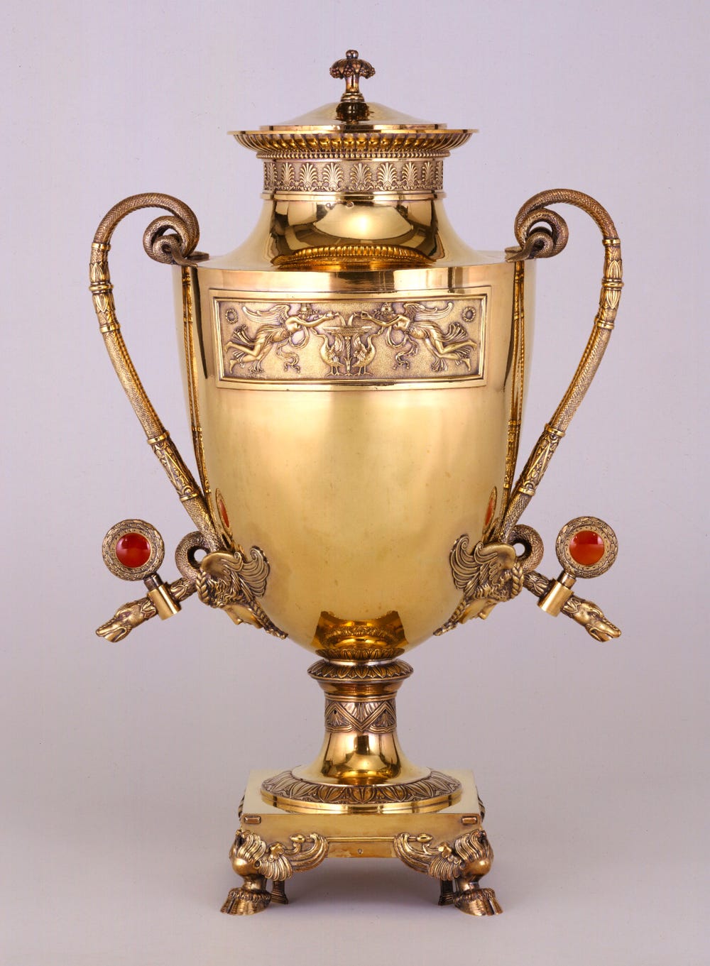 decorated gold urn