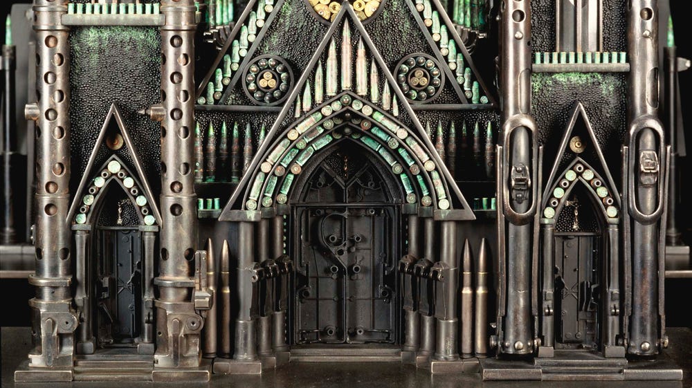 cathedral sculpture made up of gun parts