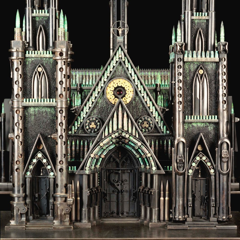 cathedral sculpture made up of gun parts