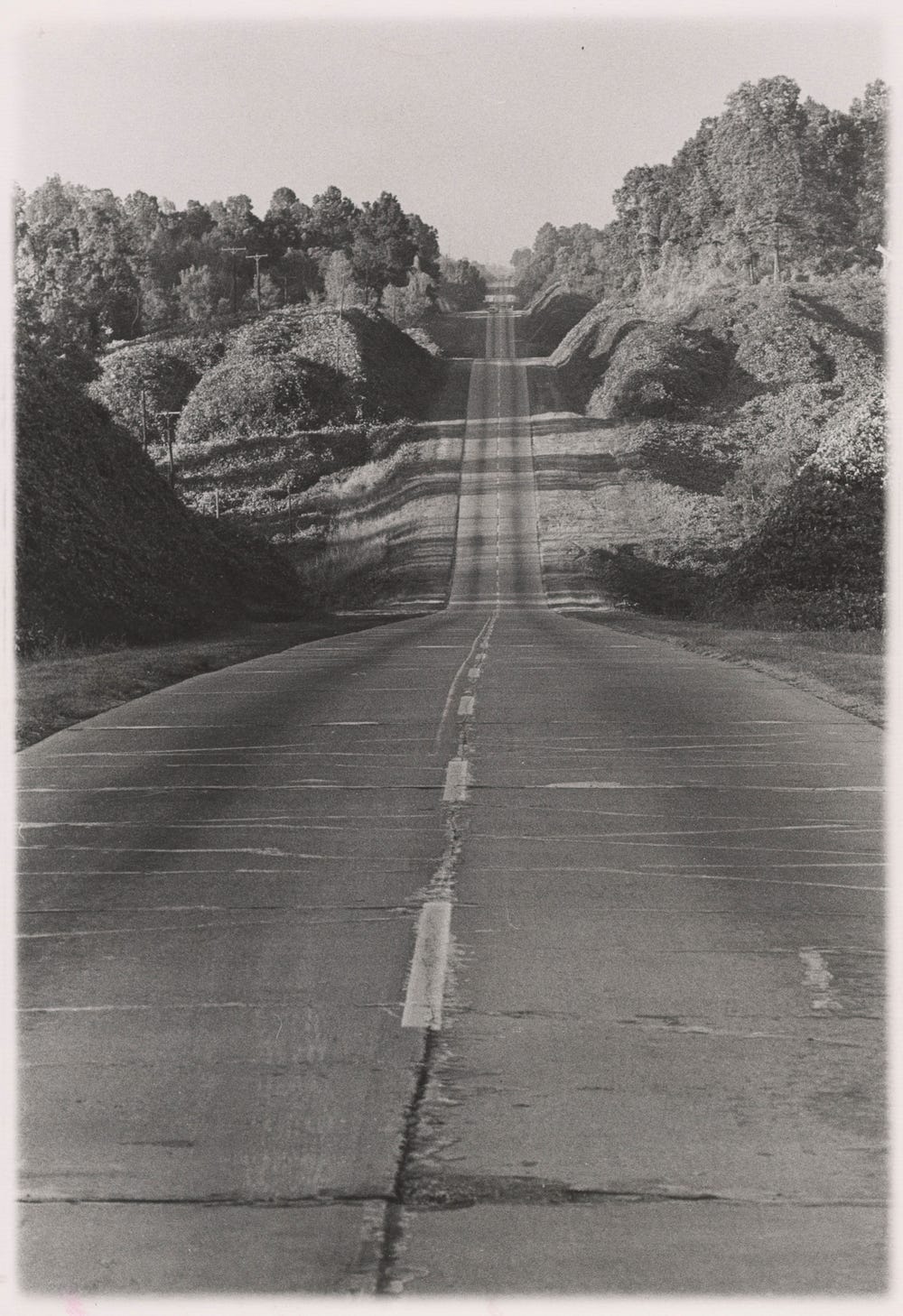 black and white photo of a road