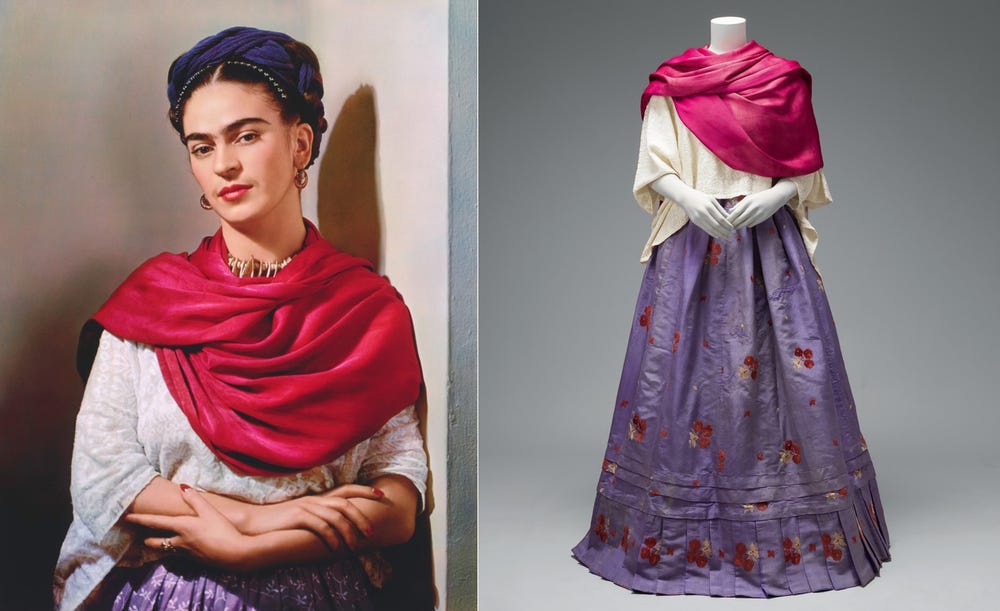 L: Frida Kahlo with a red scarf and her hands holding her forearms; R: her outfit on a mannequin, with the red scarf, a cream blouse, and purple skirt