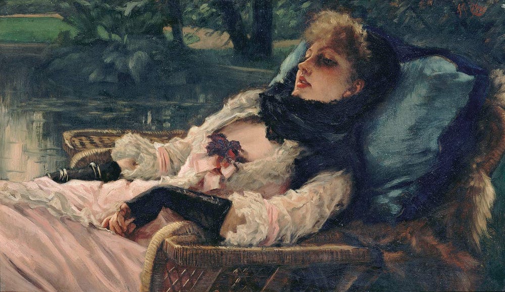 Woman laying down and looking ahead into the distance