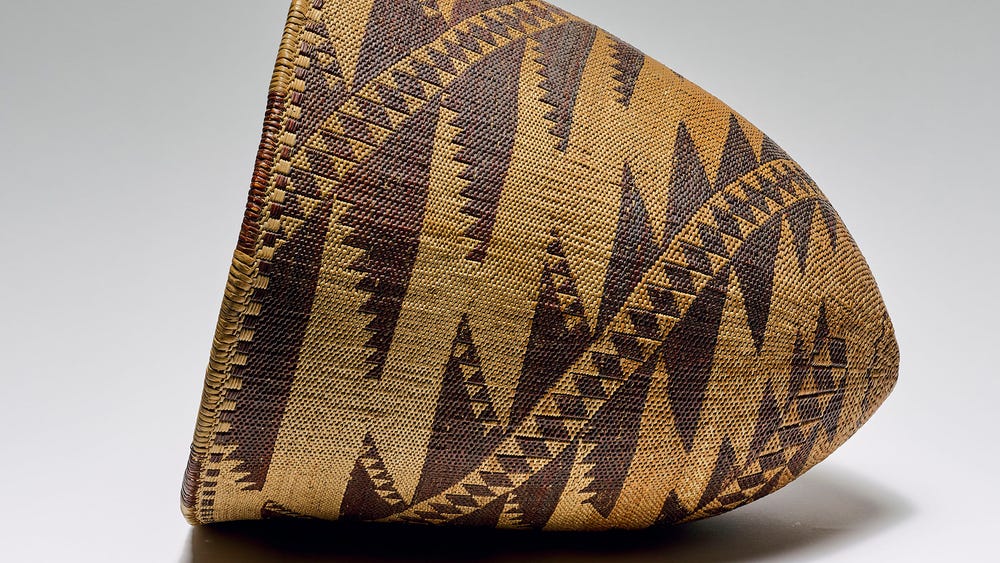 side view of a woven basket with a geometric design
