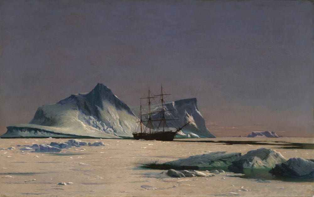 ship on an icy sea near icebergs