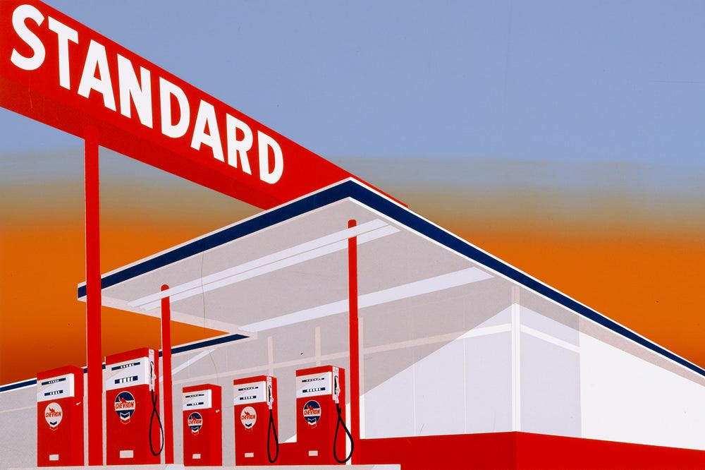 print of a gas station in reds, oranges, and blues
