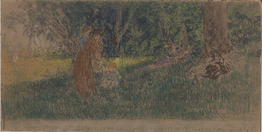 two adults and a child outdoors in grassy area with trees