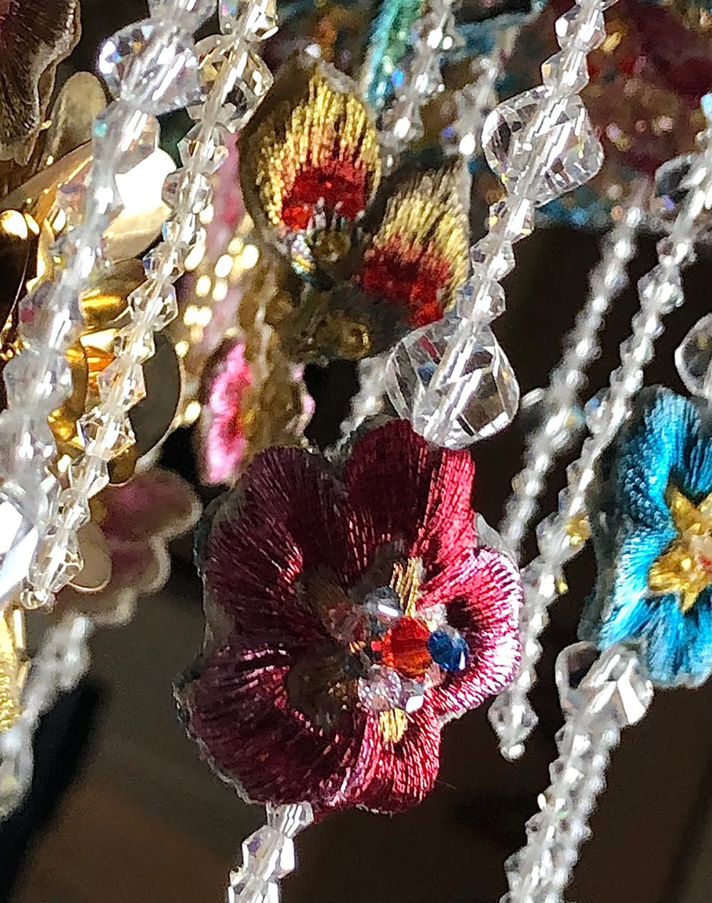 close-up of embroidered flowers and beading
