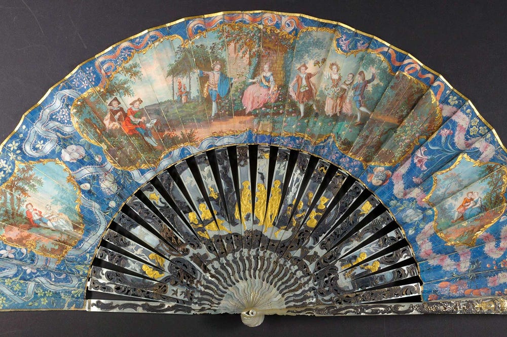 fan depicting a country dance