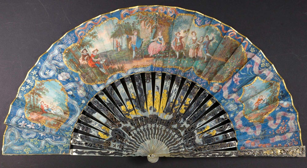 fan depicting a country dance