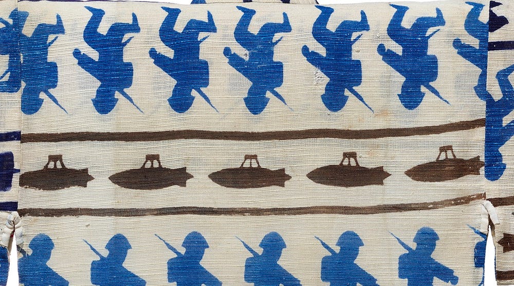 fabric showing blue troops and brown submarines
