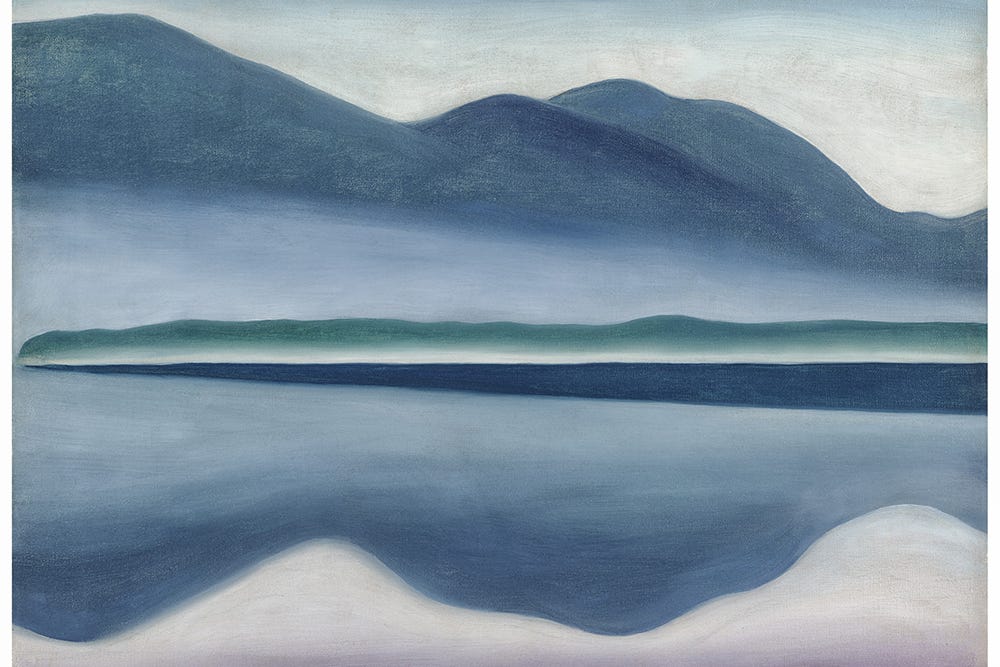 Painting of blue and white mountains next to a lake.
