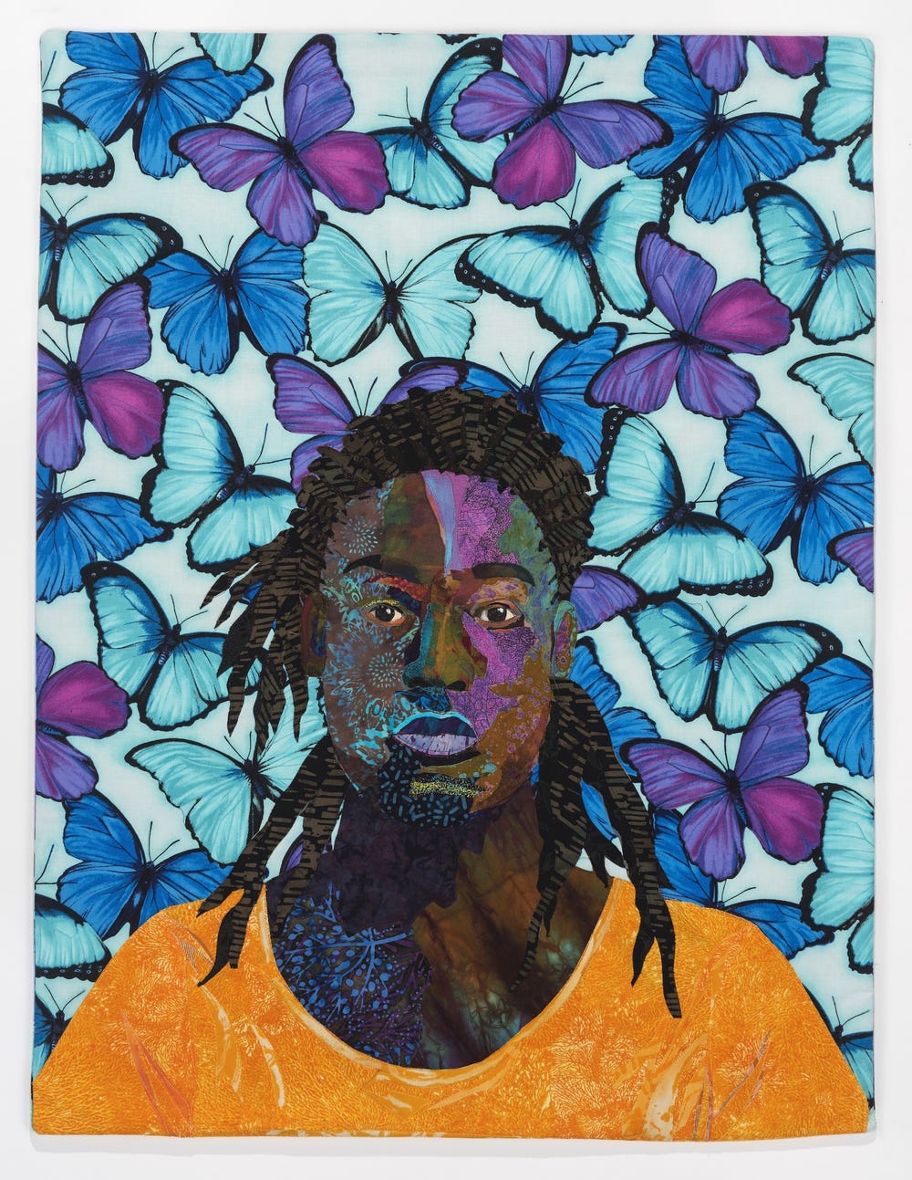 portrait of a Black woman with butterflies in the background
