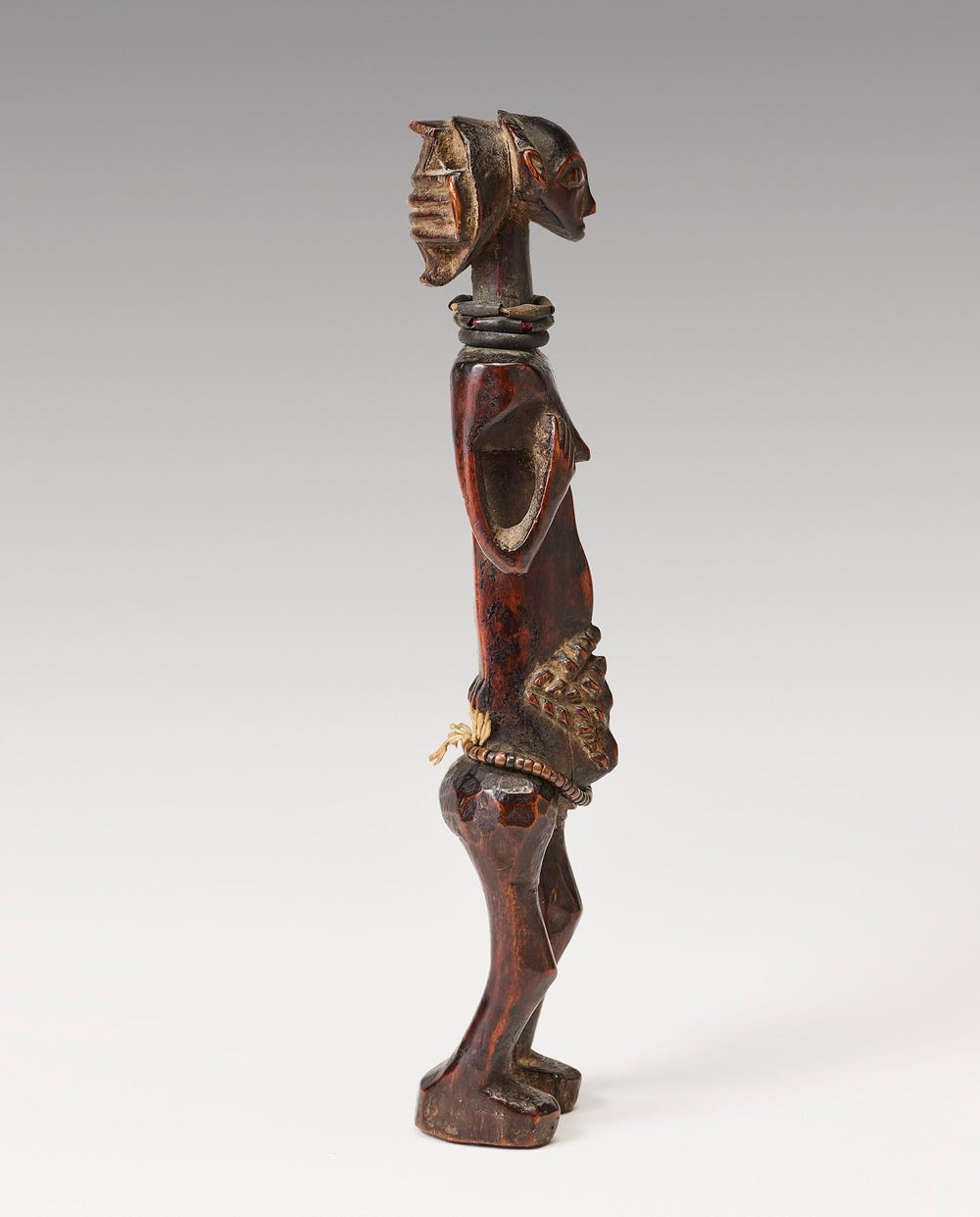 side view of wooden figure