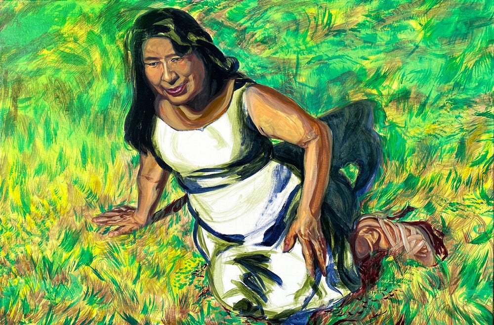 woman sitting in the grass