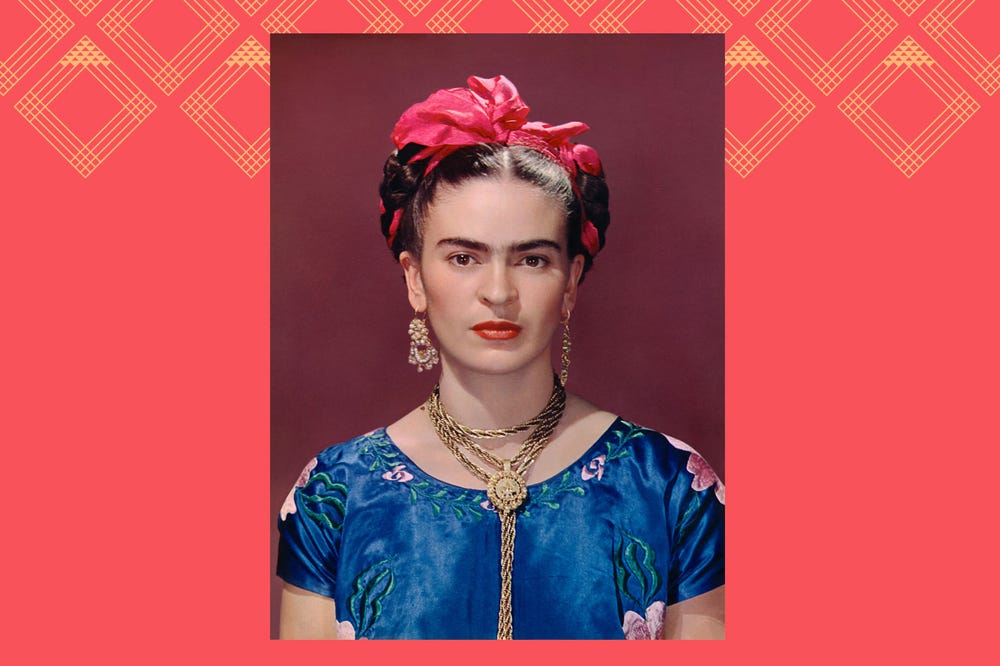 Portrait of Frida Kahlo wearing a blue dress