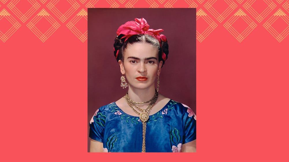 Portrait of Frida Kahlo wearing a blue dress
