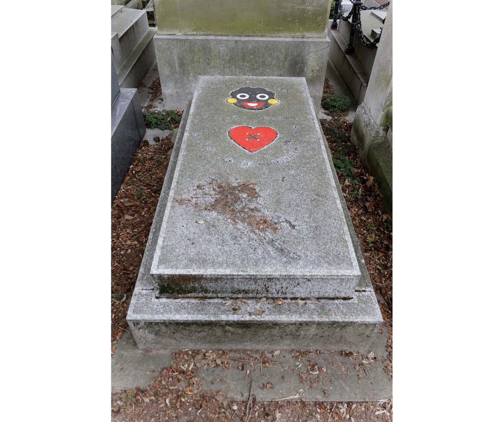 tombstone with golliwog and heart