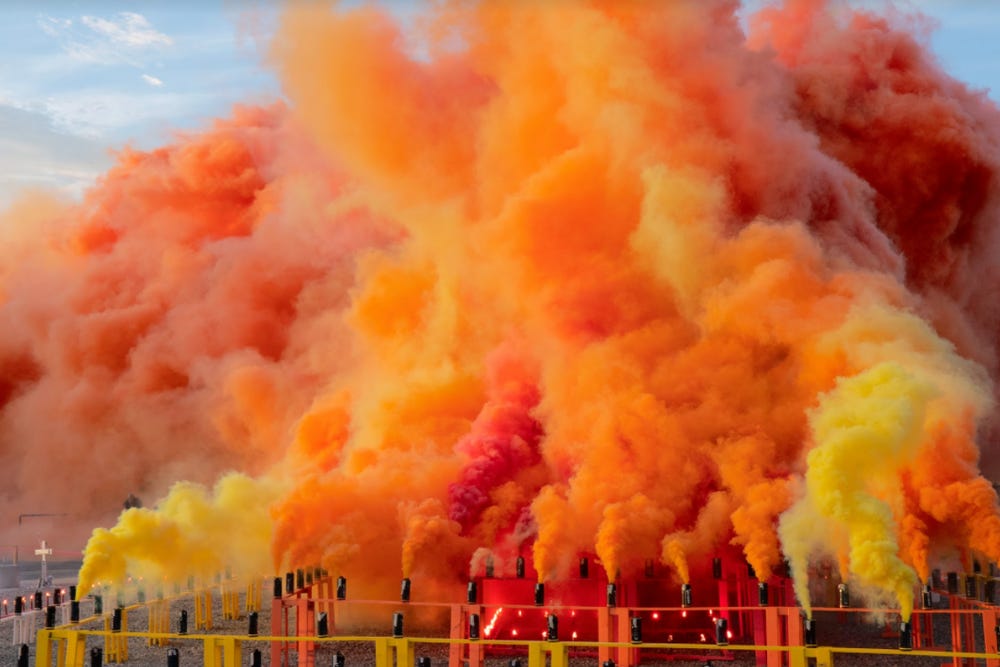 Photograph of orange and yellow smoke