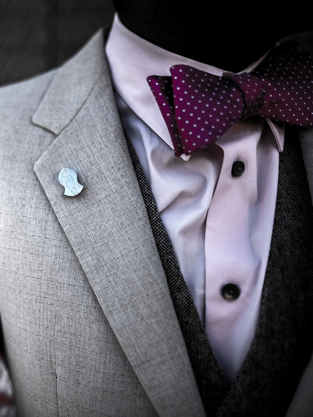 close-up of a man's suit, with bow tie