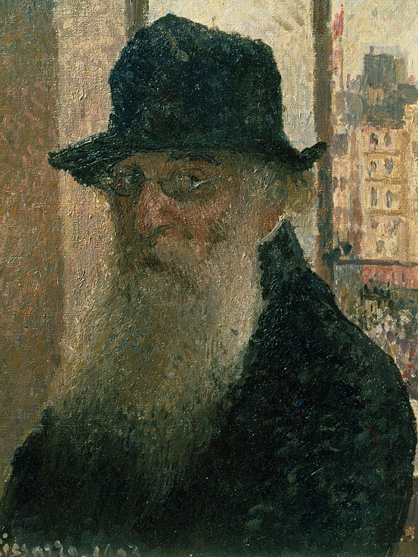 Portrait of older bearded man wearing a hat.