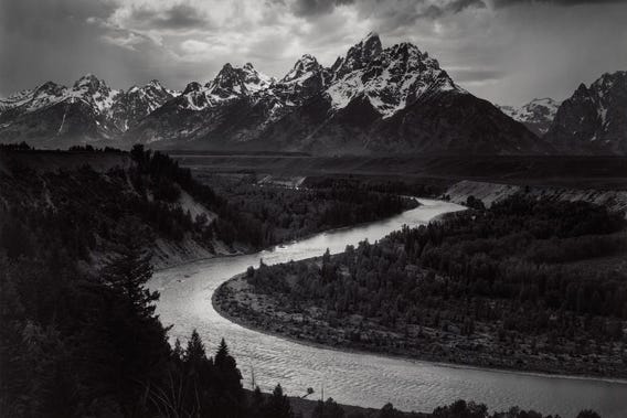 Black and white photo of the Grand Tetons by Ansel Adams