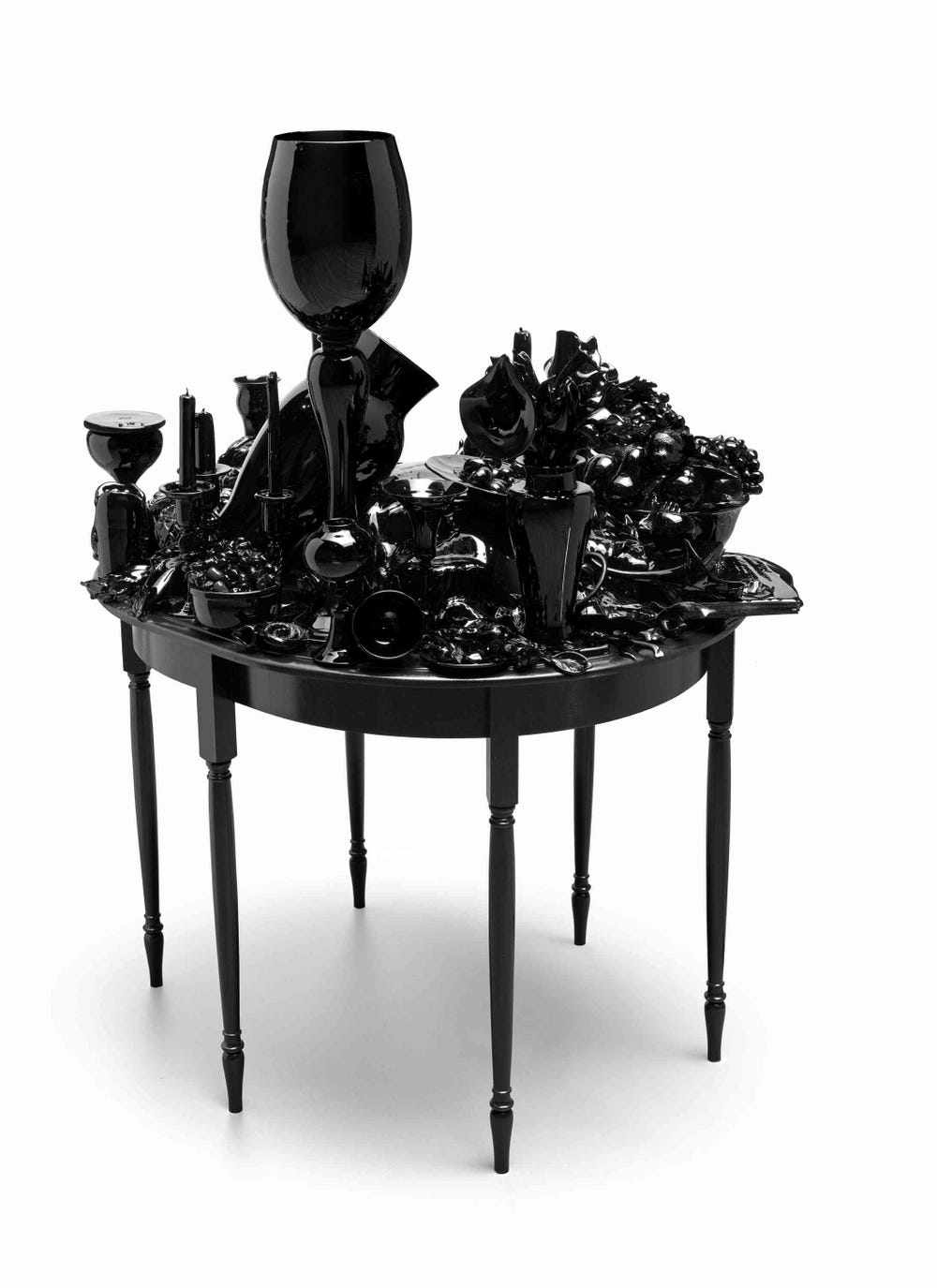 Black table covered in black objects