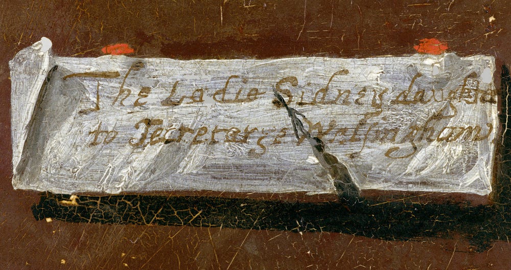 Close-up of painted label with a recreated inscription.