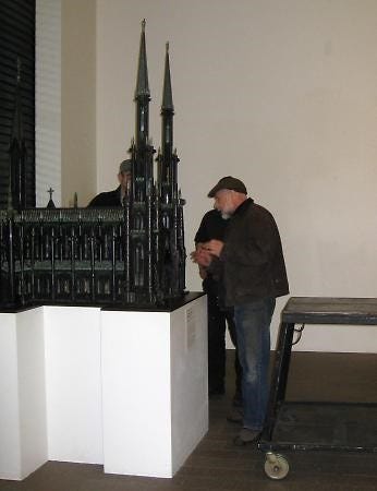 Al Farrow with his sculpture of a cathedral