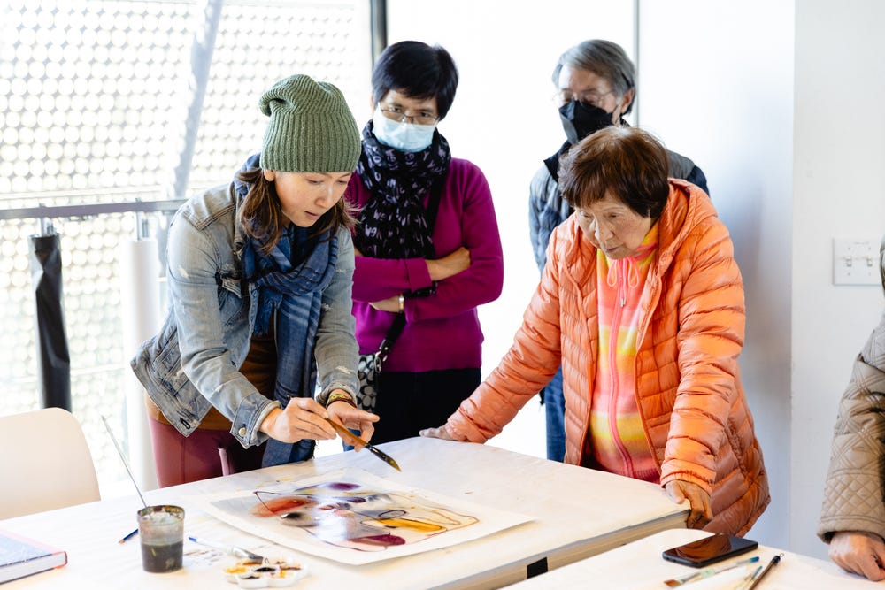 People making art in a Vitality Arts class at the de Young