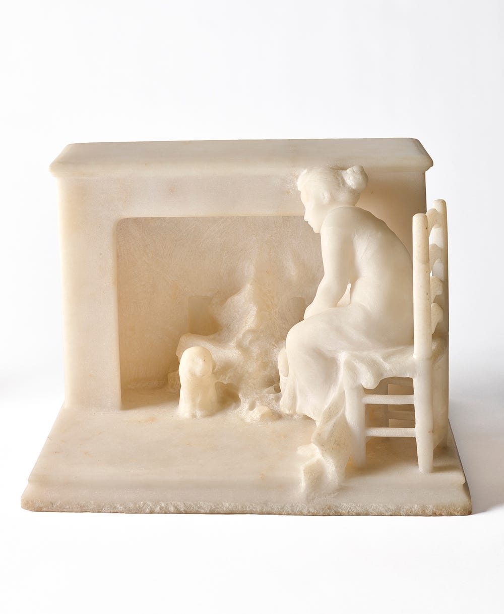 Sculpture of a woman by a fireside by Camille Claudel