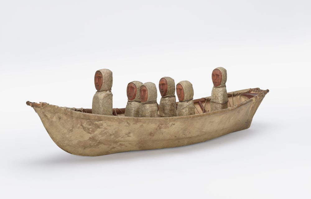 Sculpture of people in a boat