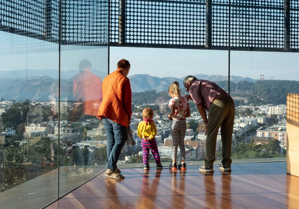 family in the Hamon Tower at the de Young